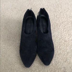 Black booties with zippers